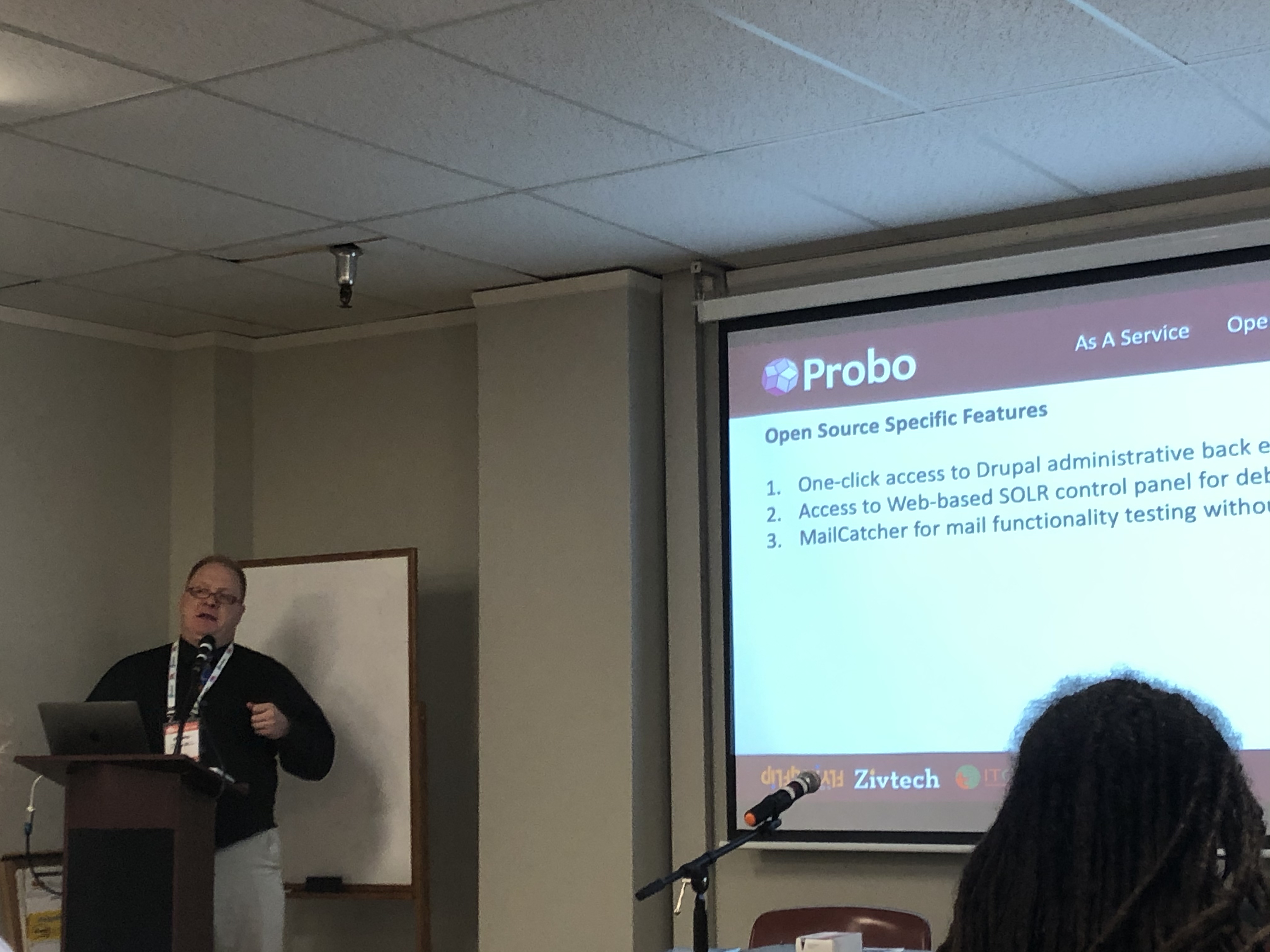 Michael giving a presentation on Probo CI